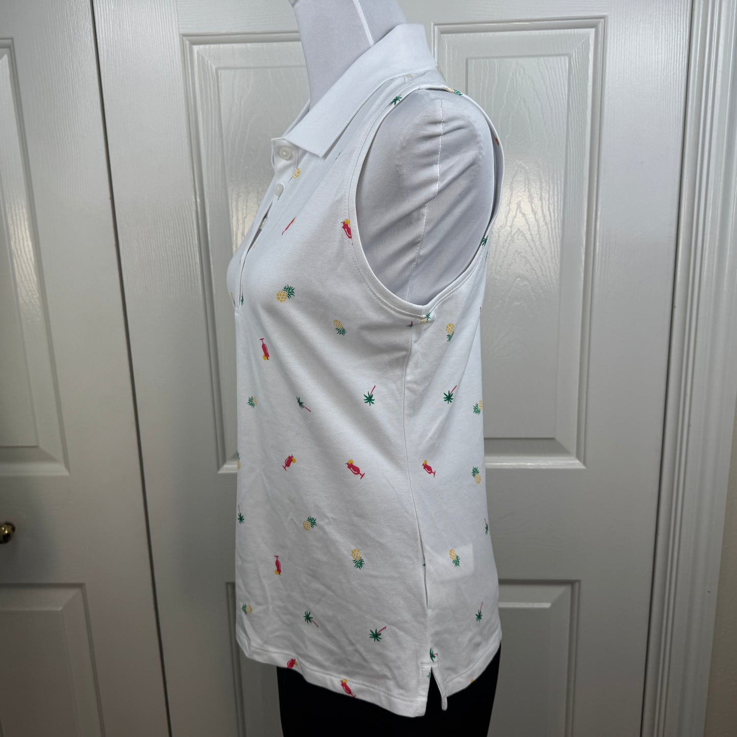 Tommy Bahama NWT Women's Everyday Active Tropical Print Sleeveless Polo White Size MNWT Tommy Bahama Women's Everyday Active Tropical Print Sleeveless Polo White Size M