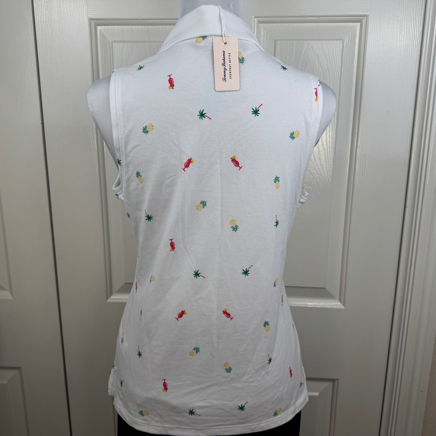 Tommy Bahama NWT Women's Everyday Active Tropical Print Sleeveless Polo White Size MNWT Tommy Bahama Women's Everyday Active Tropical Print Sleeveless Polo White Size M
