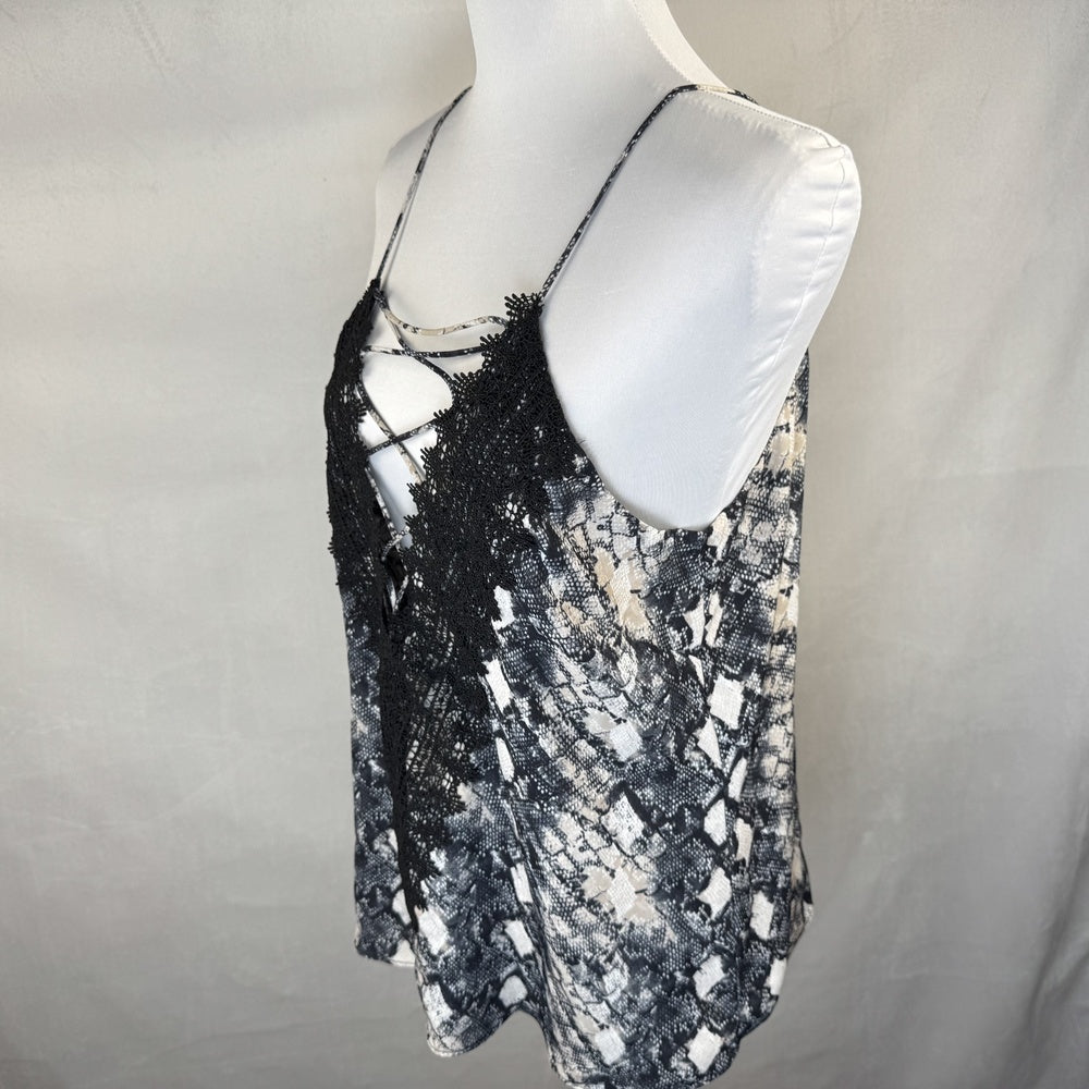 Side View on Wayf camisole black lace top on a mannequin against a white background