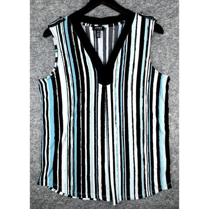 A sleeveless V-neck top with vertical black, white, and light blue stripes, hanging on a black hanger against a gray textured background.
