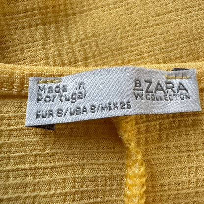 Zara BW Top Sz S Yellow Short Sleeve Round Neck Asymmetrical Peplum Hem