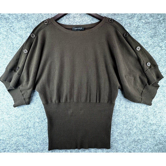 An olive brown knit sweater with elbow-length sleeves featuring decorative buttons, laid flat on a textured light blue-gray background.