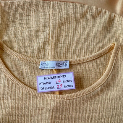 Zara BW Top Sz S Yellow Short Sleeve Round Neck Asymmetrical Peplum Hem