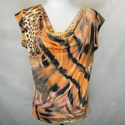 A short-sleeve cowl-neck top with a mixed animal print pattern featuring tiger stripes, leopard spots, and snake skin textures in orange, brown, black, and beige, displayed on a white mannequin torso against a gray background.
