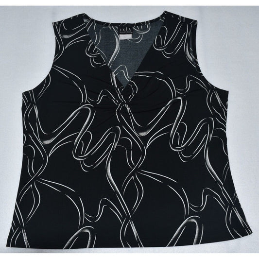 A sleeveless black V-neck top with an abstract white wavy line pattern, laid flat on a light gray background.