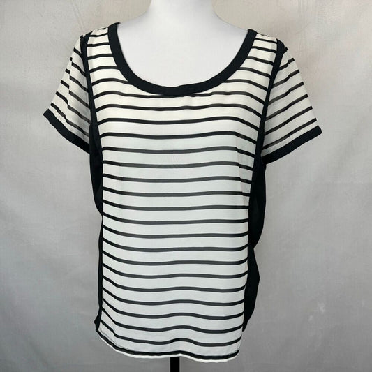 A black and white horizontally striped short-sleeve top displayed on a white mannequin torso against a light gray fabric backdrop.