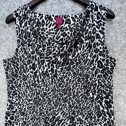 A sleeveless cowl-neck top with a black and white leopard print pattern, hanging on a black hanger against a gray textured background. A pink neck label shows the brand '112'.