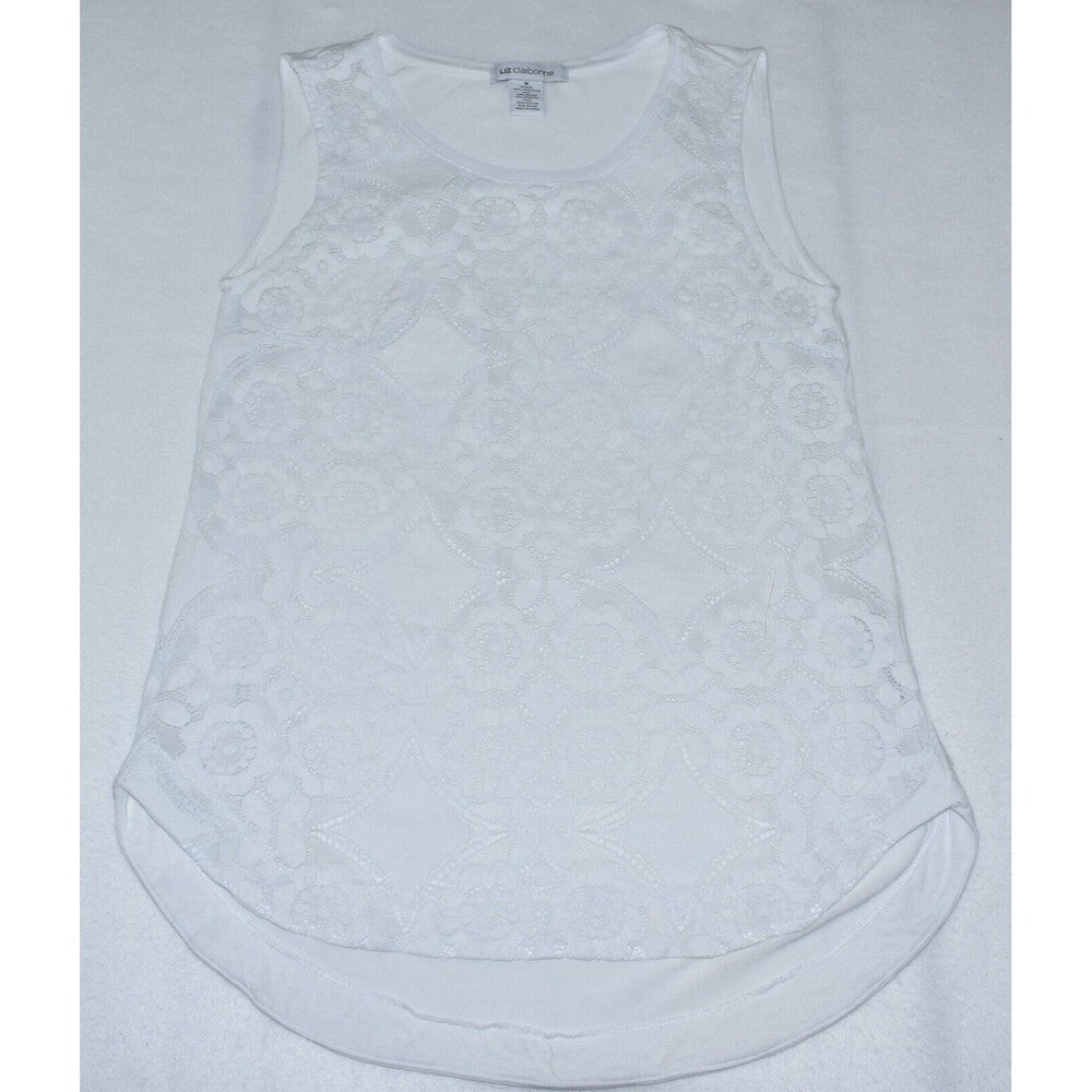 A white sleeveless top with an intricate floral lace overlay, laid flat on a white textured fabric background.