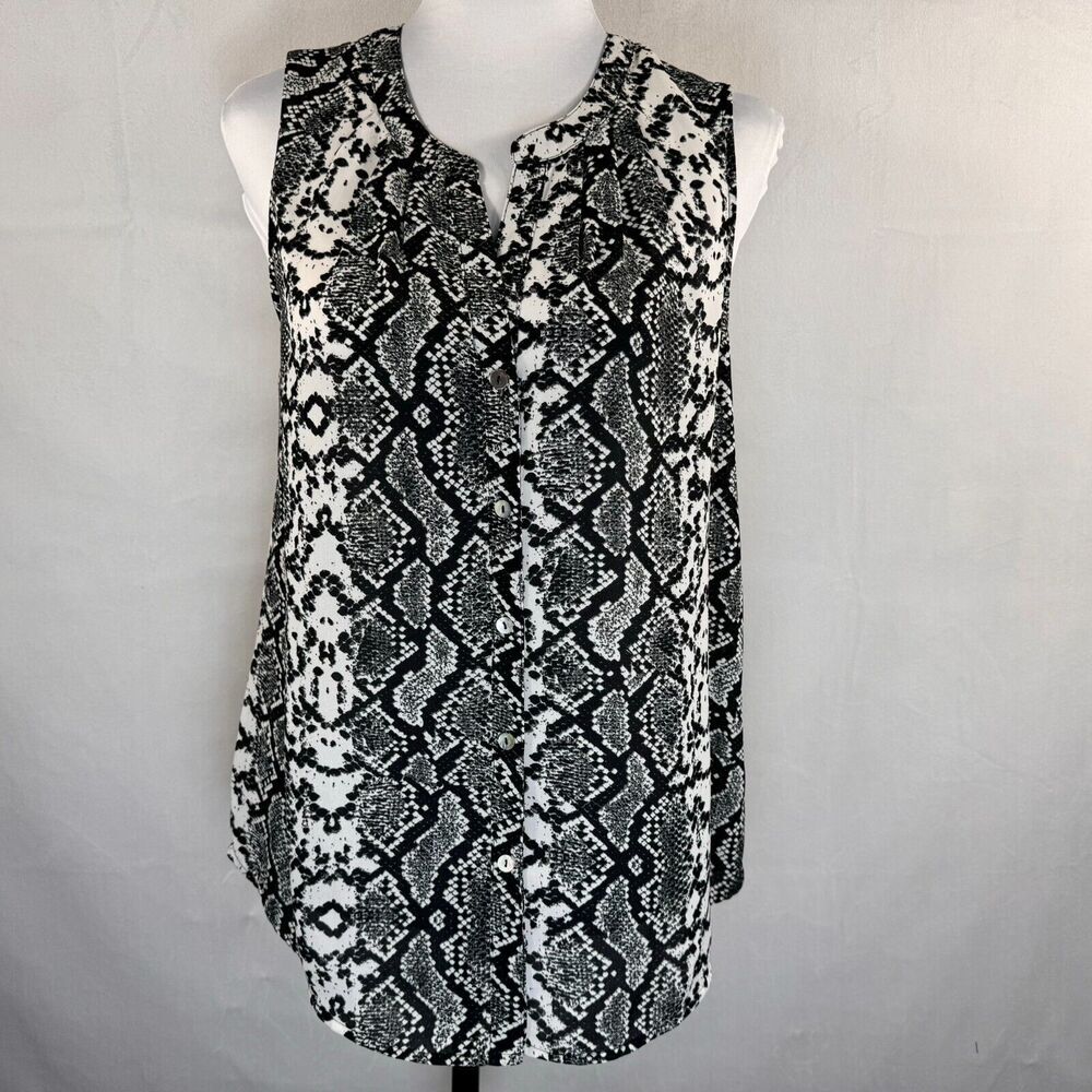 A sleeveless black and white snakeskin print top displayed on a white mannequin torso against a light gray fabric backdrop.