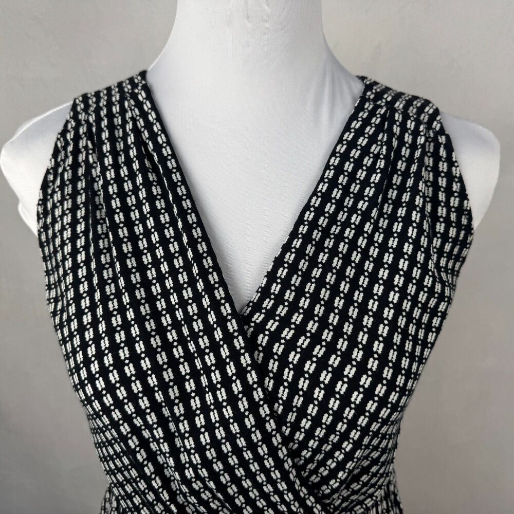 Chelsea 28 Women Sz XS Top Black Geo Ivory Print Peplum Surplice VNeck Faux Wrap