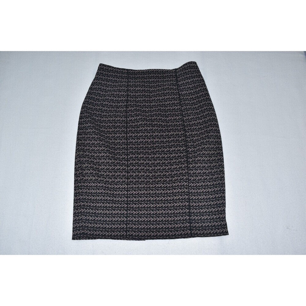 A black and gray textured knit pencil skirt with a subtle chevron pattern, laid flat on a light gray background.
