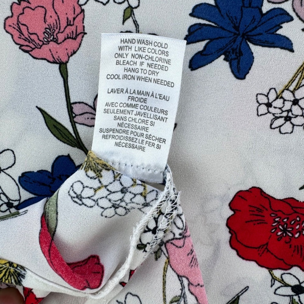 DR2 Top Women Sz SX Cream and floral Ladder Stitch Neckline and Cap Sleeve