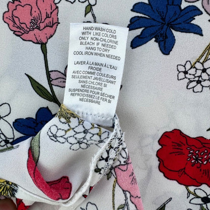 DR2 Top Women Sz SX Cream and floral Ladder Stitch Neckline and Cap Sleeve