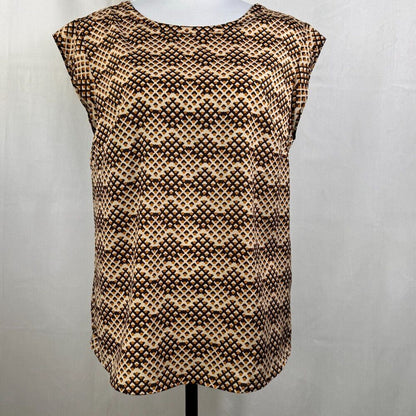 A sleeveless top with a brown and beige geometric pattern, displayed on a mannequin against a light gray background.