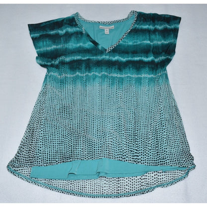 A women's short-sleeve V-neck top with a teal and black tie-dye ombre pattern, featuring a dotted mesh texture on the lower half and a solid teal band at the hem.