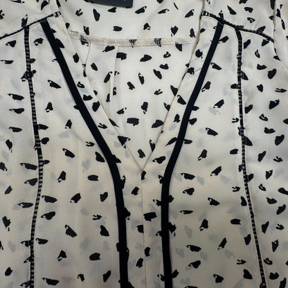 ASTR Blouse Sz XS Beige Black Print VNeck Ladder Stitch Trim Cuffed Long Sleeve