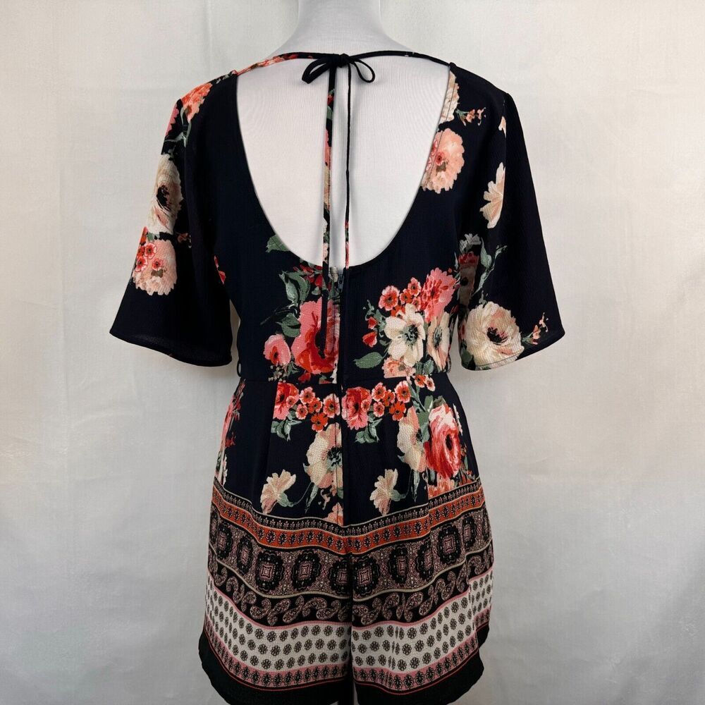 Trixxi Clothing Co Romper Sz S Black Navy Floral Ruffled Sleeve Surplice Wrap