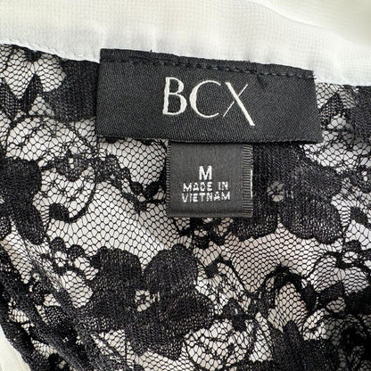 BCX Ladies Blouse Sz M White VNeck Ruffles Sleeveless Black Lace Back