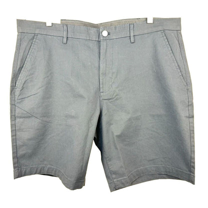 A pair of light gray chino shorts with belt loops, a button closure, and side pockets, shown flat against a white background.